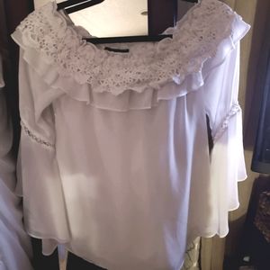 At a Resale Shop White House/Black Market